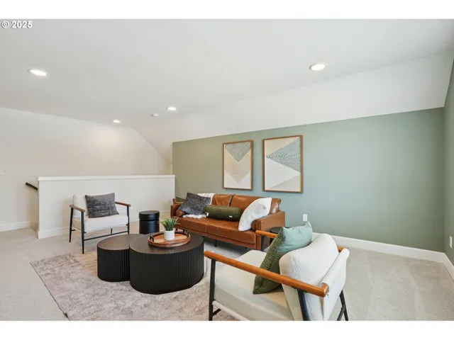 a living room with furniture and a couch