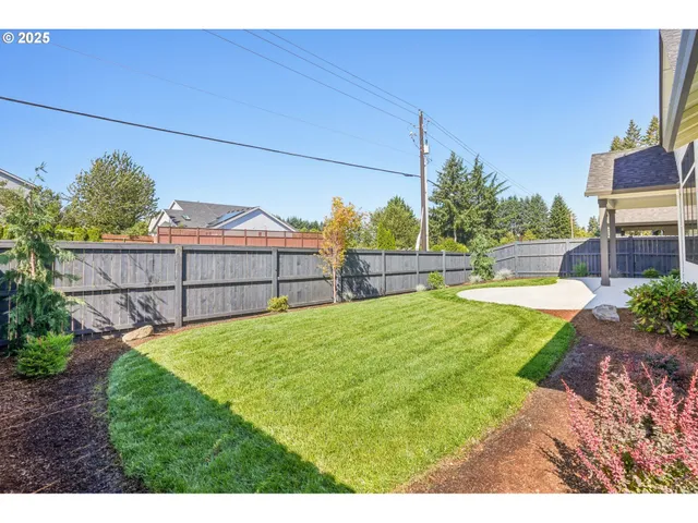 a view of backyard with green space
