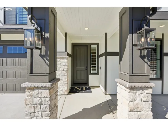 a black and white photo of a living room