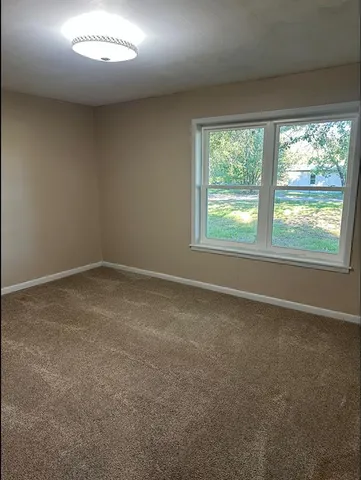 an empty room with a window