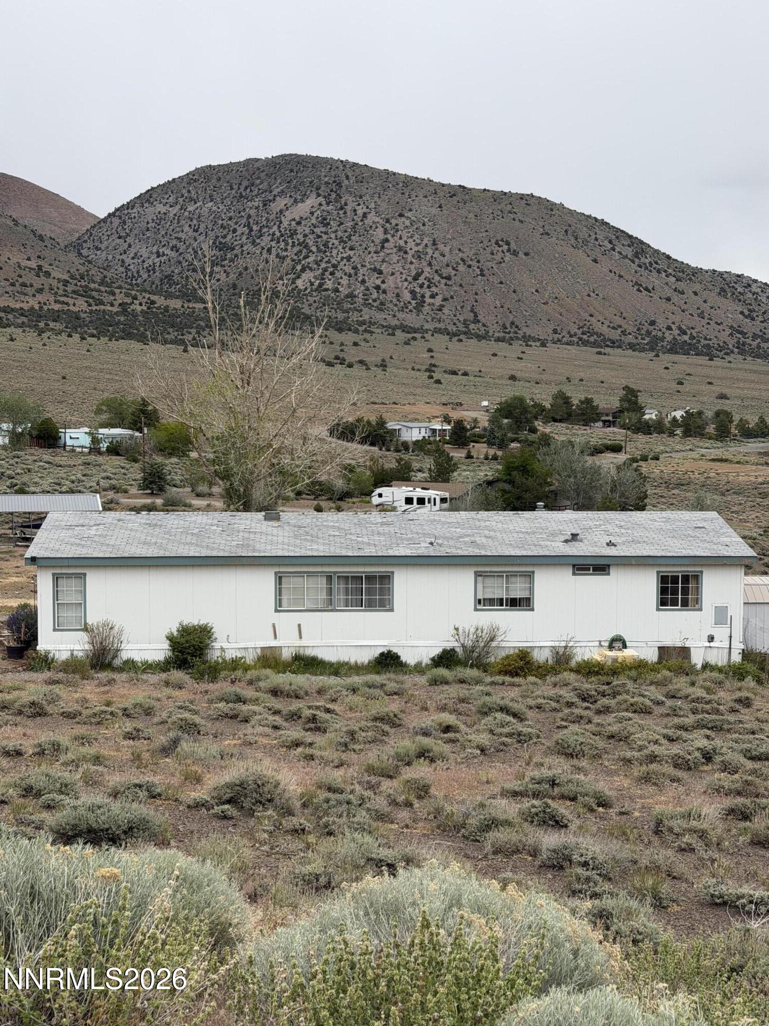 3920 Sandstone Drive Topaz Ranch Estates, NV 89444 - Photo 20 of 20 a view of house with ocean view