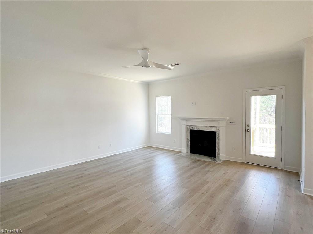 7707 Sedgewick Ridge Road Lewisville, NC 27023 - Photo 13 of 35 Main Living Space w/ Door Leading to Back Deck
