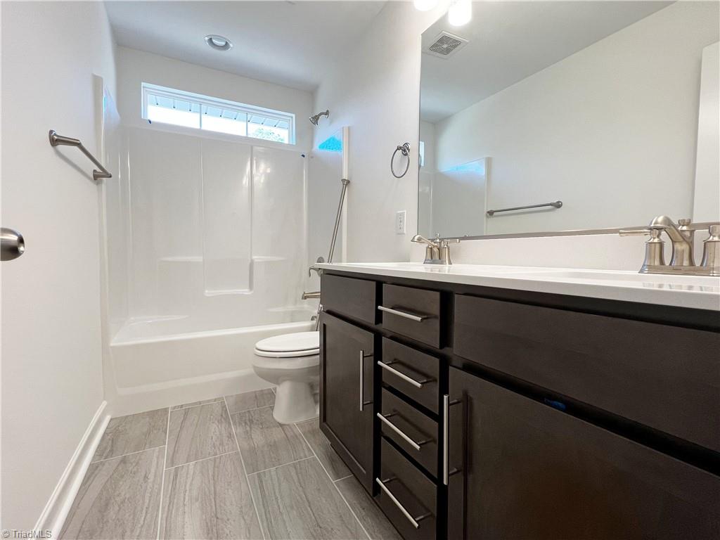 7707 Sedgewick Ridge Road Lewisville, NC 27023 - Photo 23 of 35 Upstairs Full Bath w/ Double Vanity