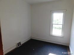 1666 Vernor Road Lapeer, MI 48446 - Photo 7 of 8 1666 Vernor den.jpg