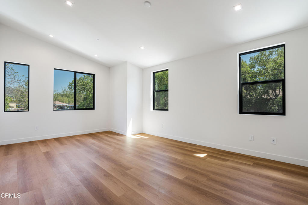2821 Los Robles Road Thousand Oaks, CA 91362 - Photo 26 of 68 a view of an empty room with wooden floor and window