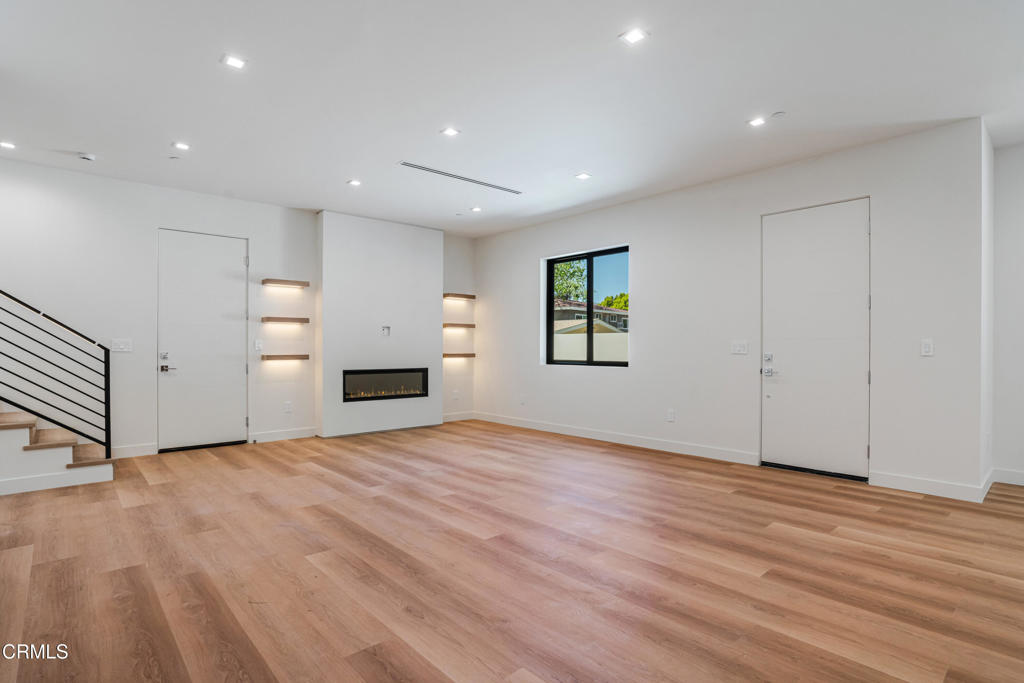 2821 Los Robles Road Thousand Oaks, CA 91362 - Photo 50 of 68 an empty room with windows and fireplace