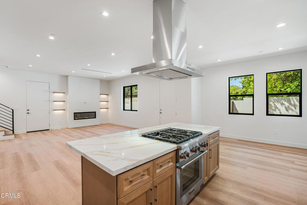 2821 Los Robles Road Thousand Oaks, CA 91362 - Photo 55 of 68 a kitchen with a stove and a wooden floor