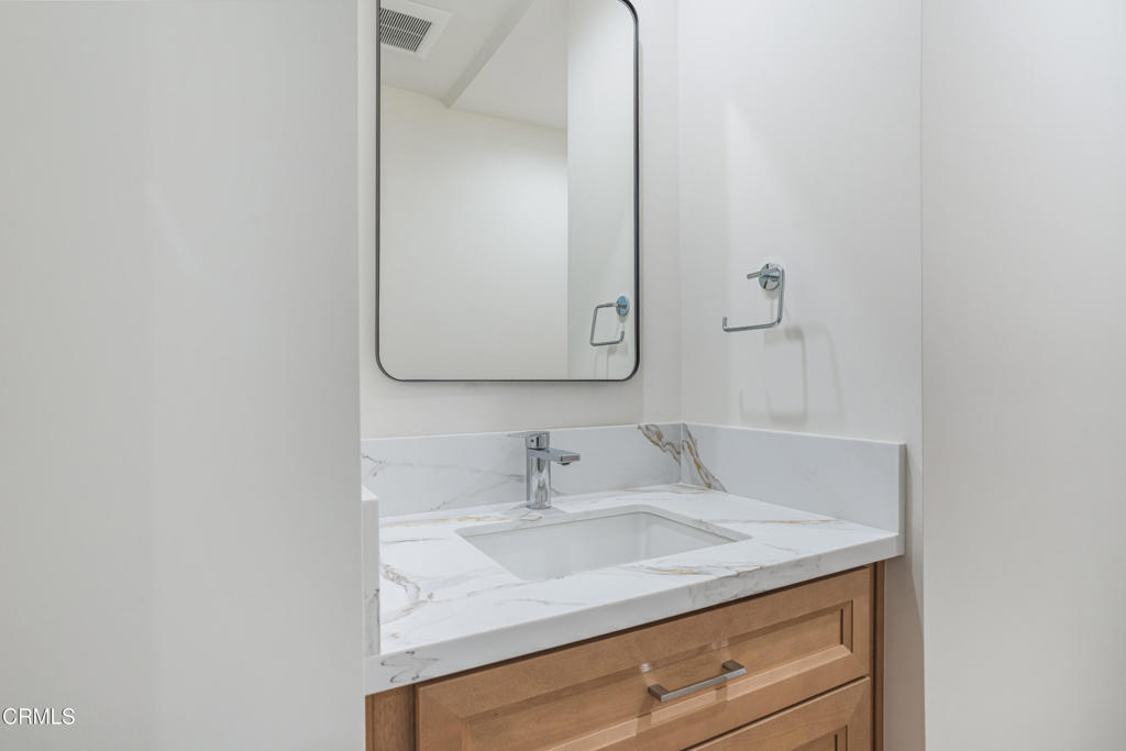 2821 Los Robles Road Thousand Oaks, CA 91362 - Photo 57 of 68 a bathroom with a sink and a mirror