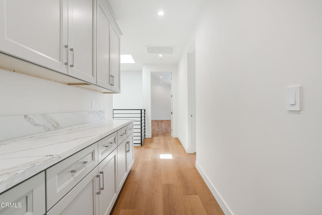 2821 Los Robles Road Thousand Oaks, CA 91362 - Photo 61 of 68 a view of a kitchen with wooden floor