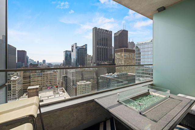 8 East Randolph Street, Unit 3004 Chicago, IL 60601 - Photo 14 of 20 a view of a roof deck with furniture