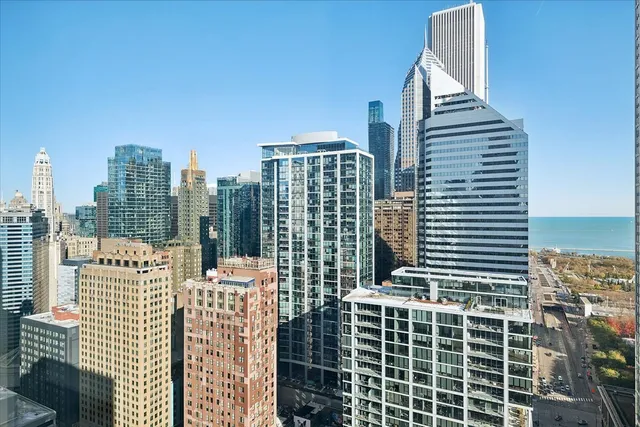 a view of a city with tall buildings