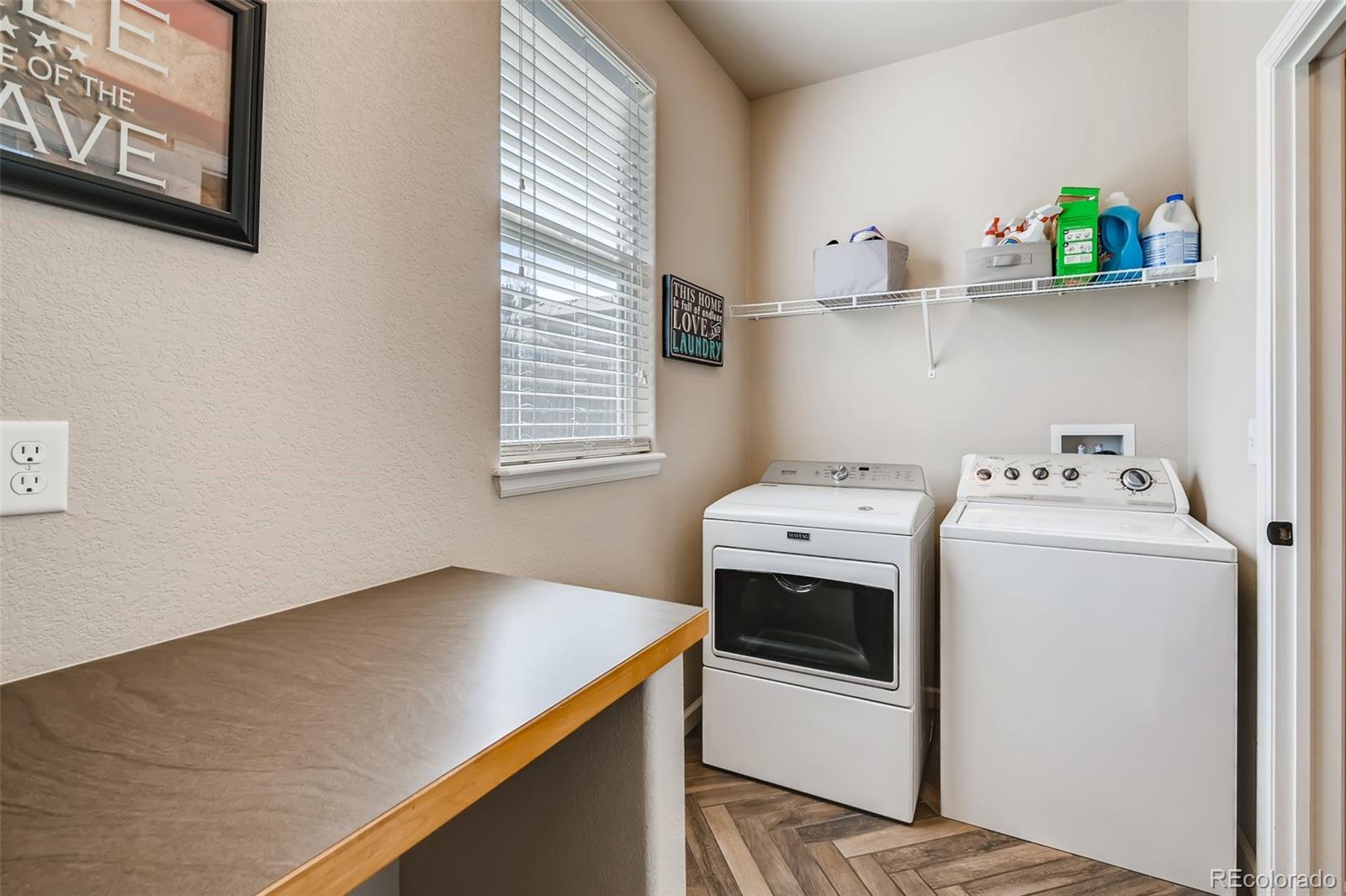 465 Territory Lane Johnstown, CO 80534 - Photo 17 of 24 a utility room with dryer and washer