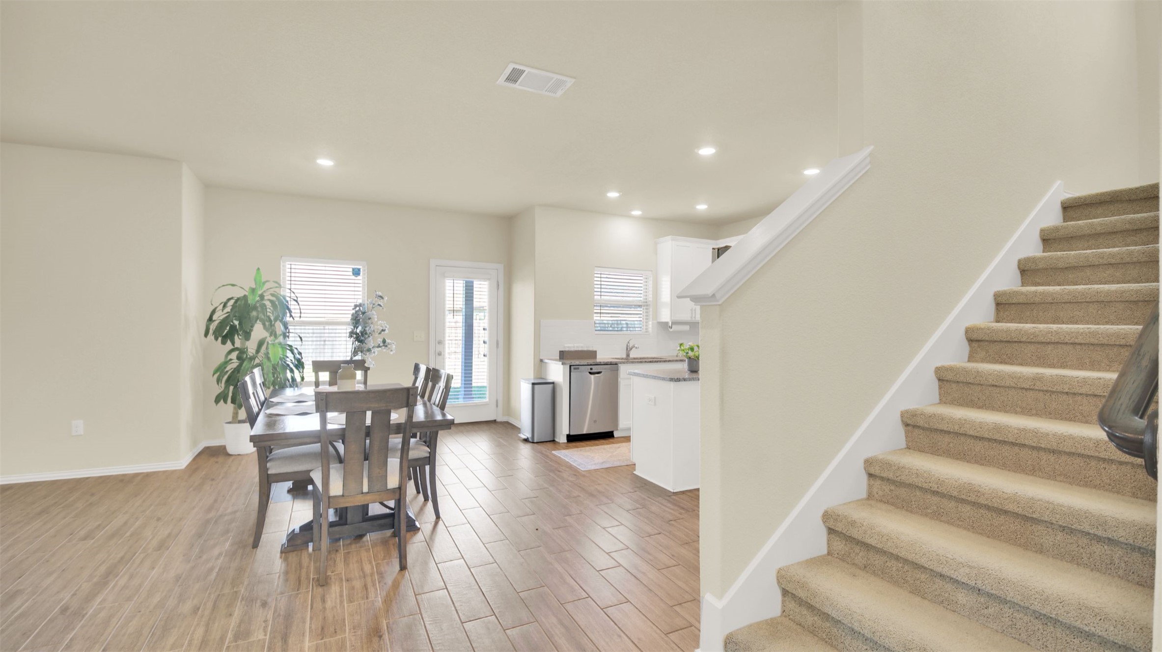 13716 Sugar Bush Path Manor, TX 78653 - Photo 13 of 37 Dining room with wood tiled floors and recessed lighting