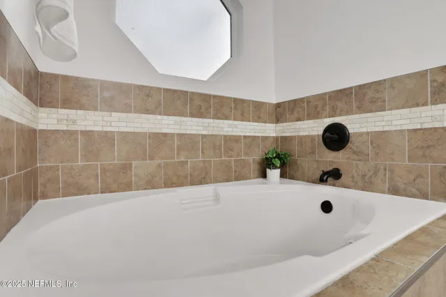 a bathroom with a tub