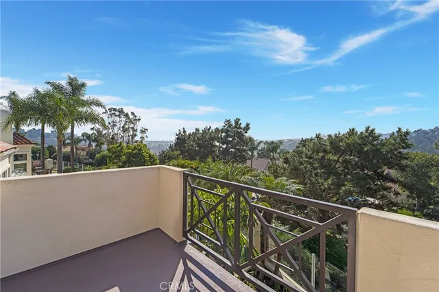 a view of balcony with furniture