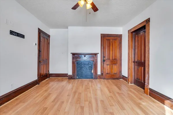 a view of parking garage with cars and other equipment