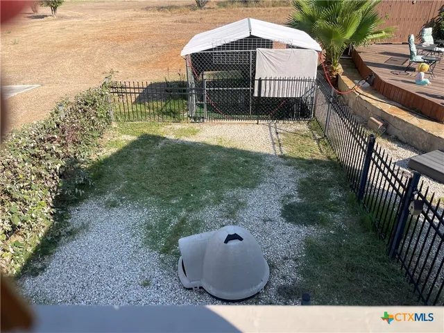 a house view with a garden space