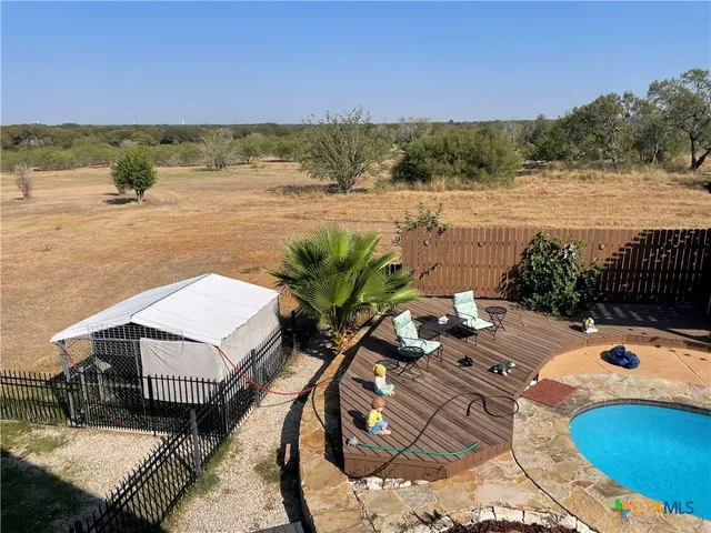a view of a lake with a yard