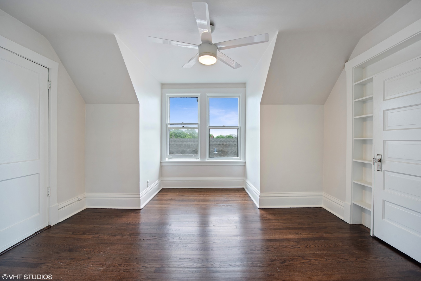 Undisclosed Address Chicago, IL 60630 - Photo 2 of 7 wooden floor in an empty room with a window