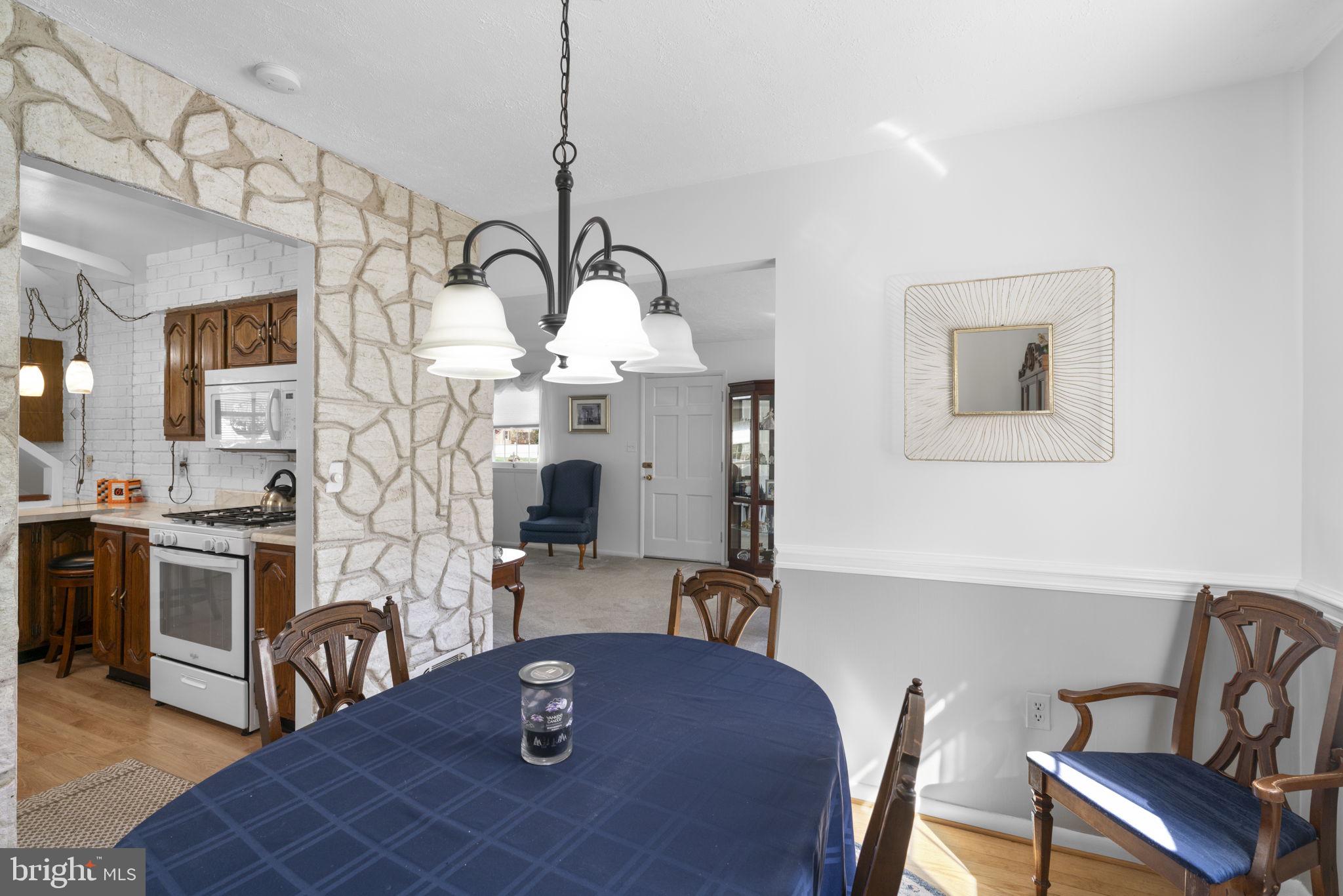 943 Homberg Avenue Baltimore, MD 21221 - Photo 10 of 34 a view of a dining room with furniture