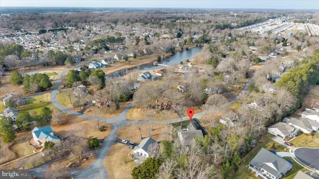 an aerial view of residential house with outdoor space