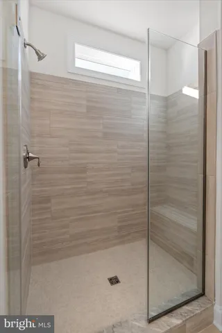 an empty room with wooden floor