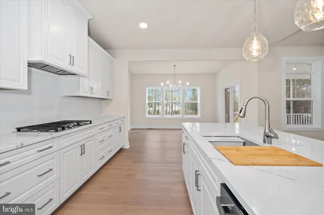 a view of an empty room with a large window