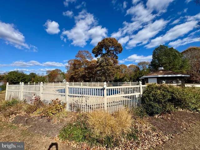 a view of a lake with a garden