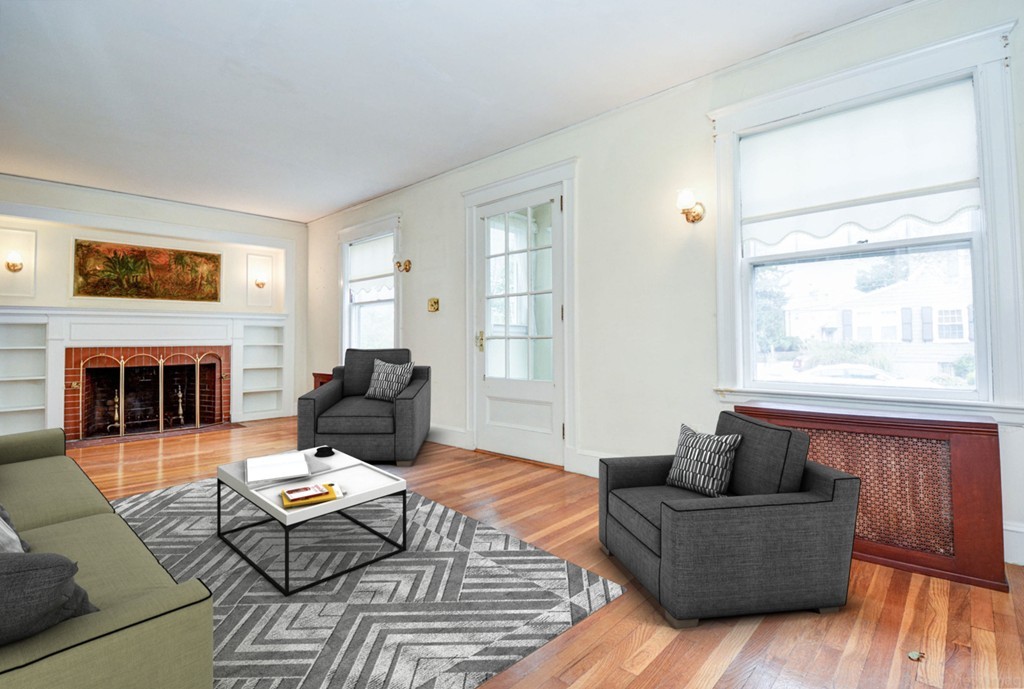 5 Governors Road Milton, MA 02186 - Photo 6 of 18 a living room with furniture fireplace and window