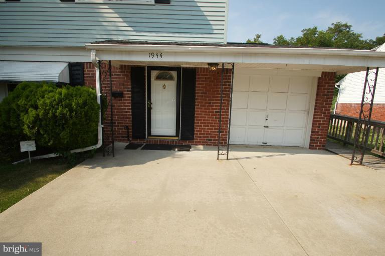 1944 Winder Road Windsor Mill, MD 21244 - Photo 22 of 28 front view of a house with a yard