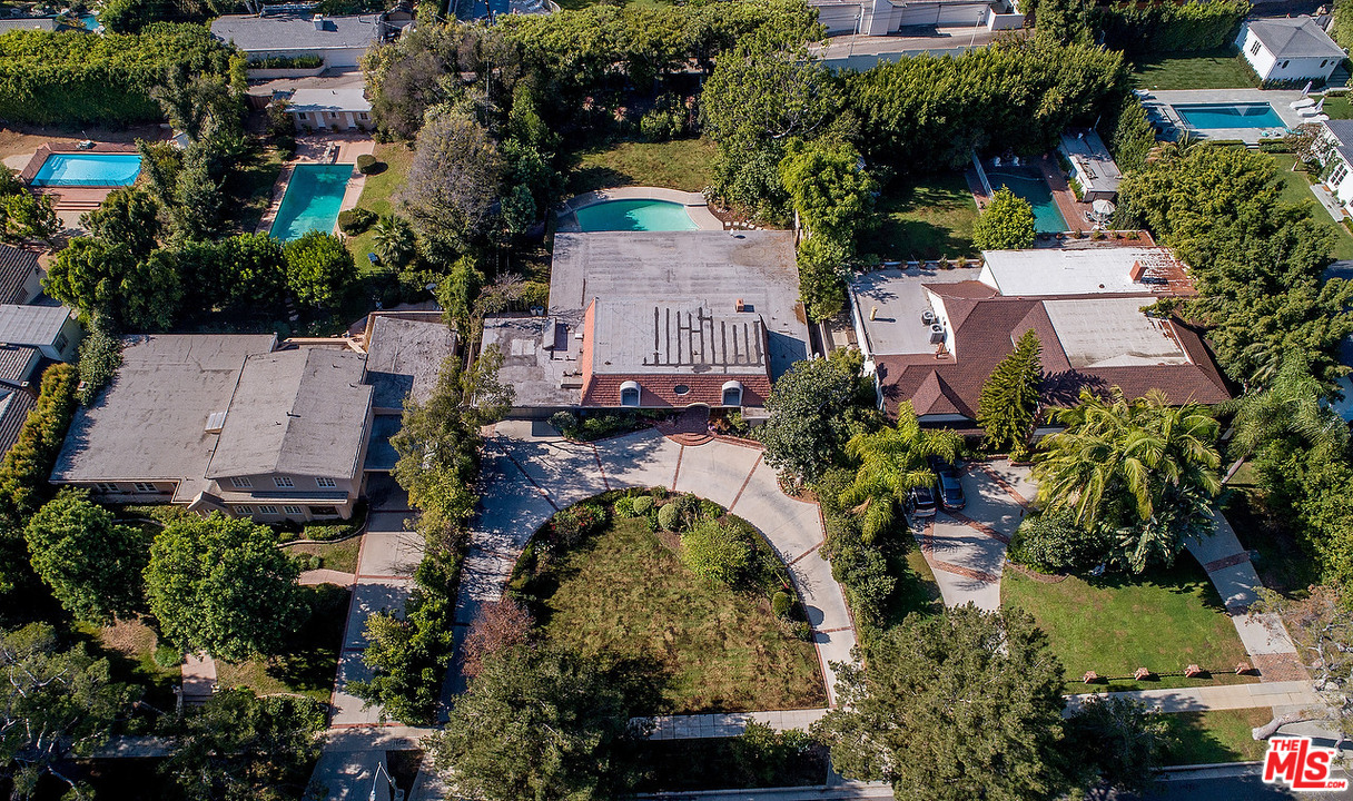 711 Sierra Drive Beverly Hills, CA 90210 - Photo 37 of 40 an aerial view of a house with a garden