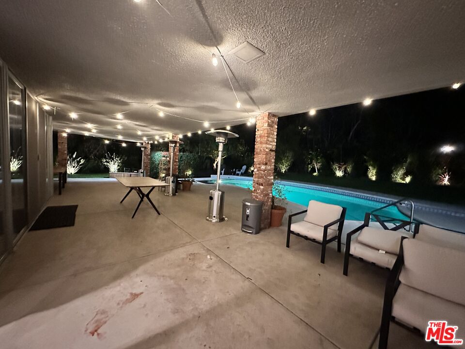711 Sierra Drive Beverly Hills, CA 90210 - Photo 39 of 40 a lobby with furniture and a potted plant