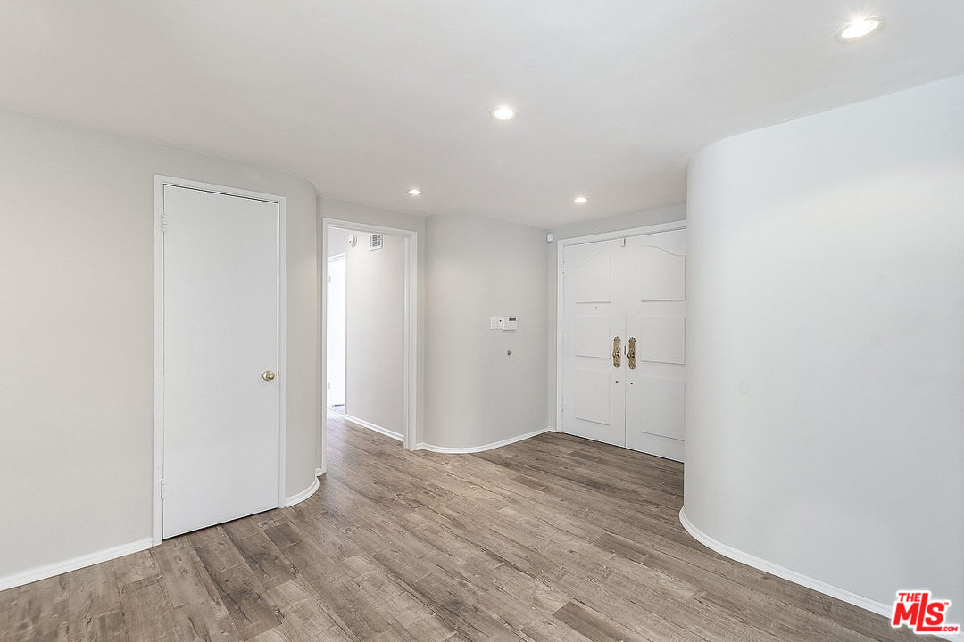 711 Sierra Drive Beverly Hills, CA 90210 - Photo 4 of 40 a view of an empty room