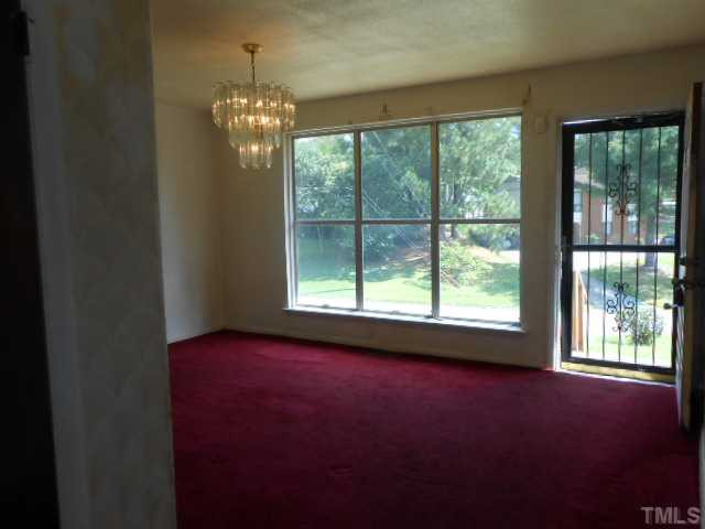 2024 Waters Drive Raleigh, NC 27610 - Photo 13 of 19 a view of an empty room with a window