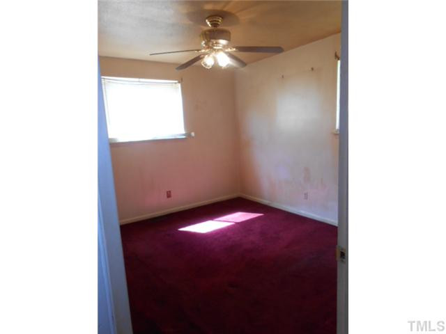 2024 Waters Drive Raleigh, NC 27610 - Photo 8 of 19 a view of an empty room with a window