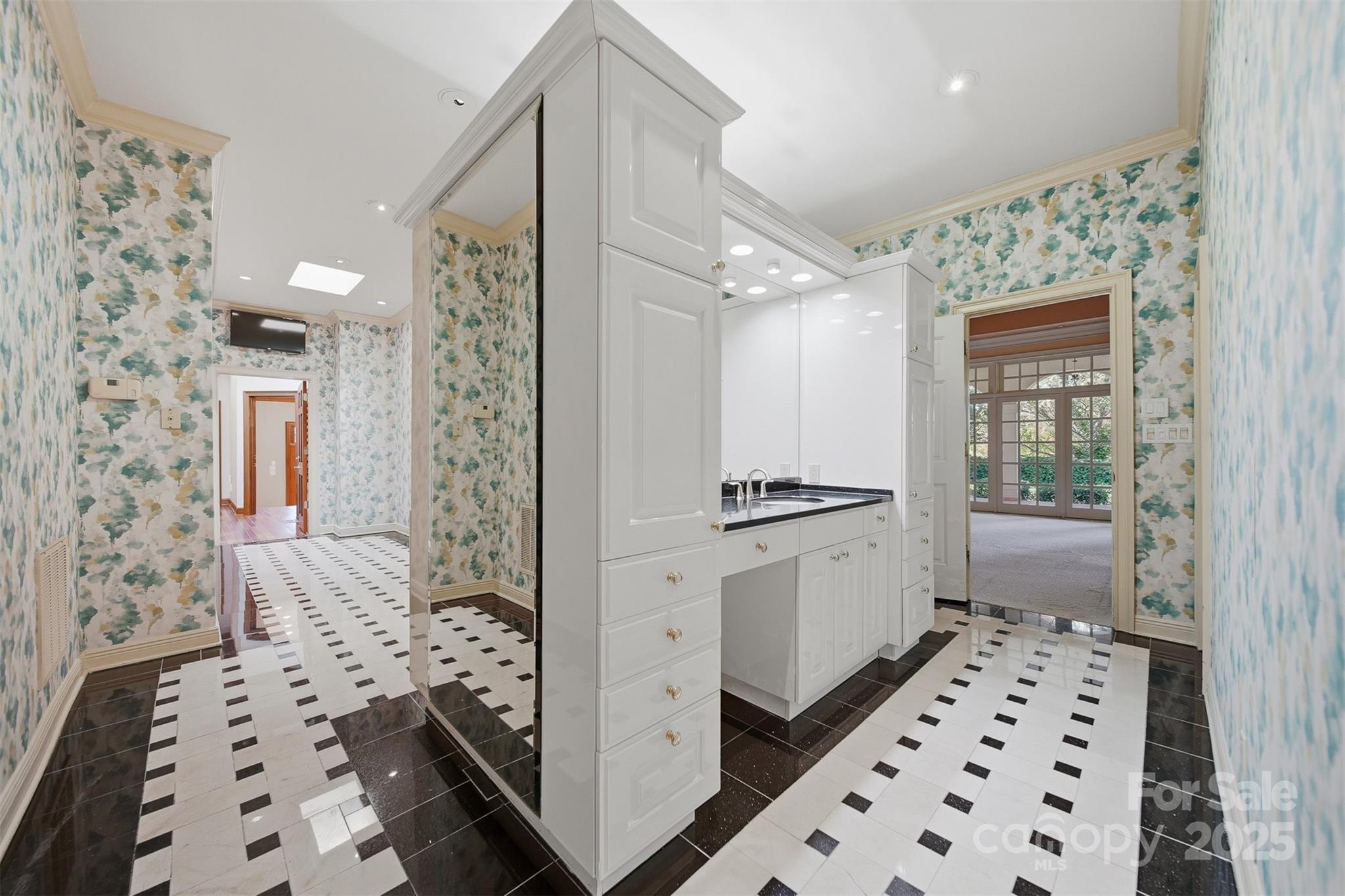 3619 Links Drive Conover, NC 28613 - Photo 18 of 48 a bathroom with a sink a mirror and a shower