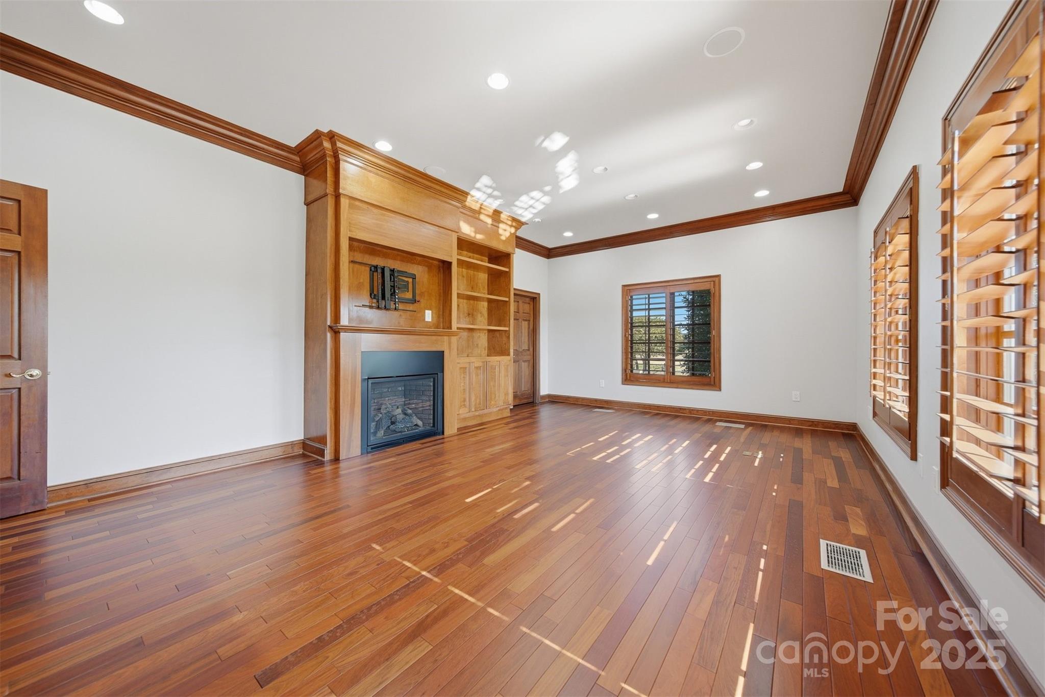 3619 Links Drive Conover, NC 28613 - Photo 21 of 48 a view of an empty room with wooden floor and a window
