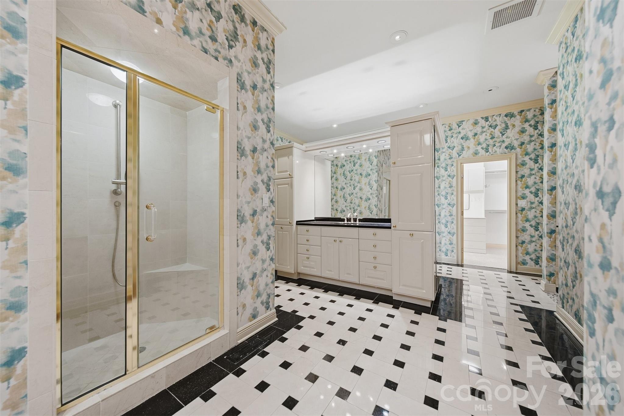 3619 Links Drive Conover, NC 28613 - Photo 24 of 48 a bathroom with a glass shower door
