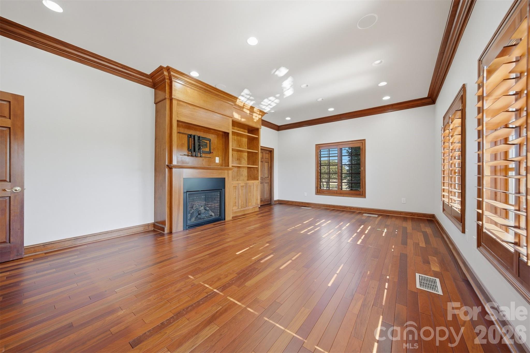 3619 Links Drive Conover, NC 28613 - Photo 26 of 48 a view of an empty room with wooden floor and a window
