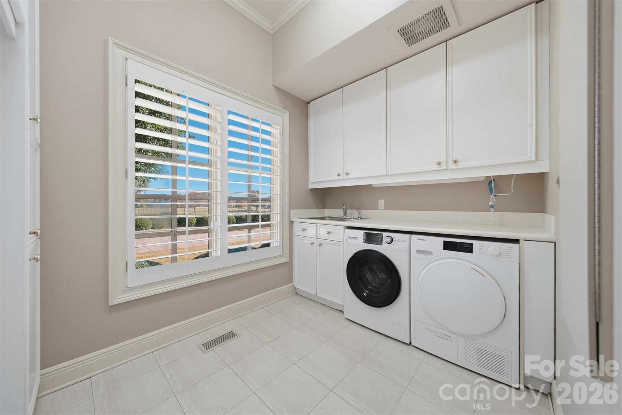 3619 Links Drive Conover, NC 28613 - Photo 29 of 48 a utility room with dryer and washer