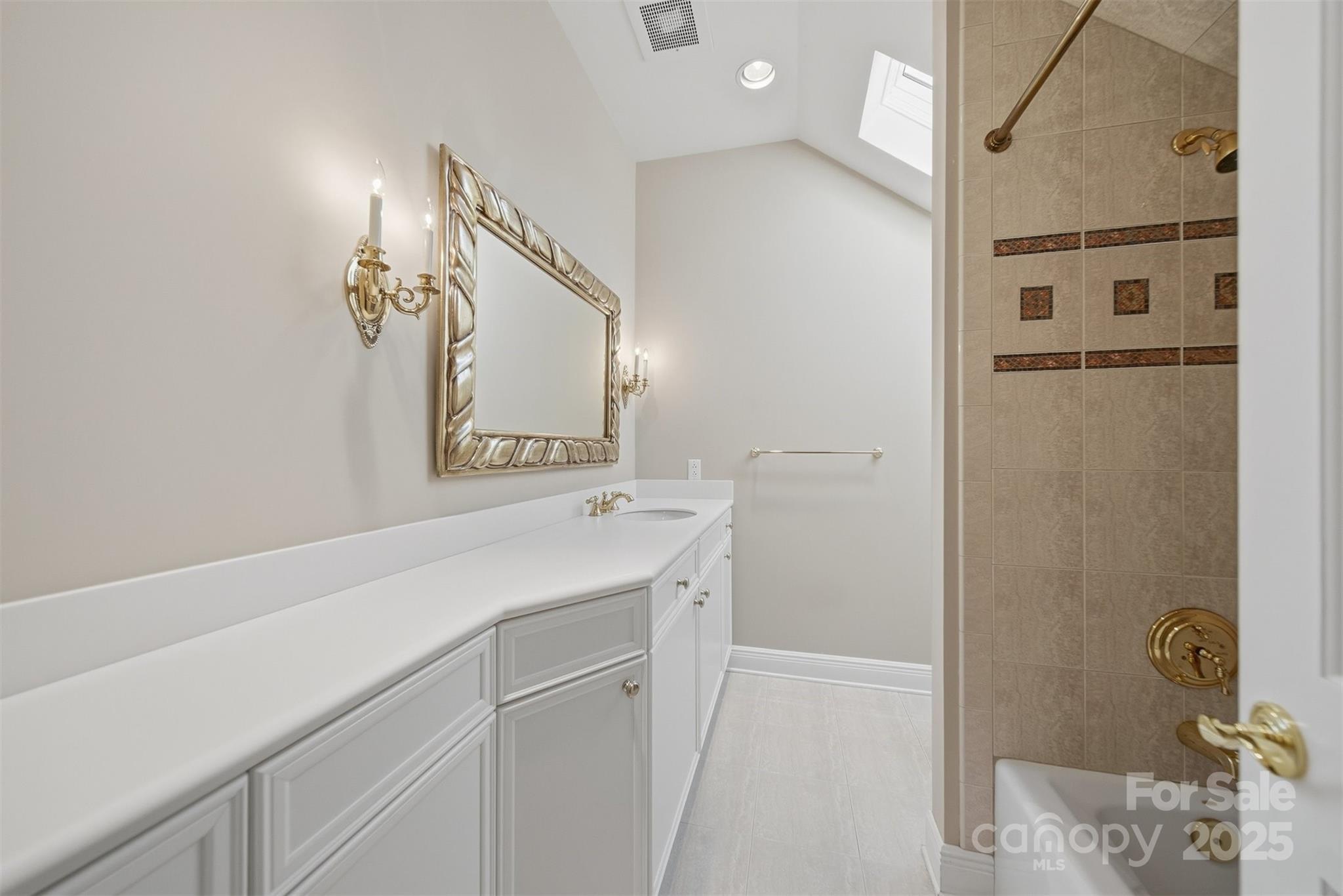 3619 Links Drive Conover, NC 28613 - Photo 33 of 48 a bathroom with a sink and mirror