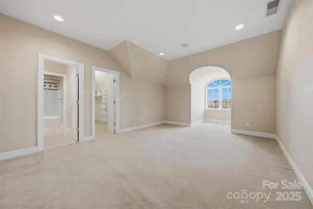 a bathroom with a bathtub and a sink