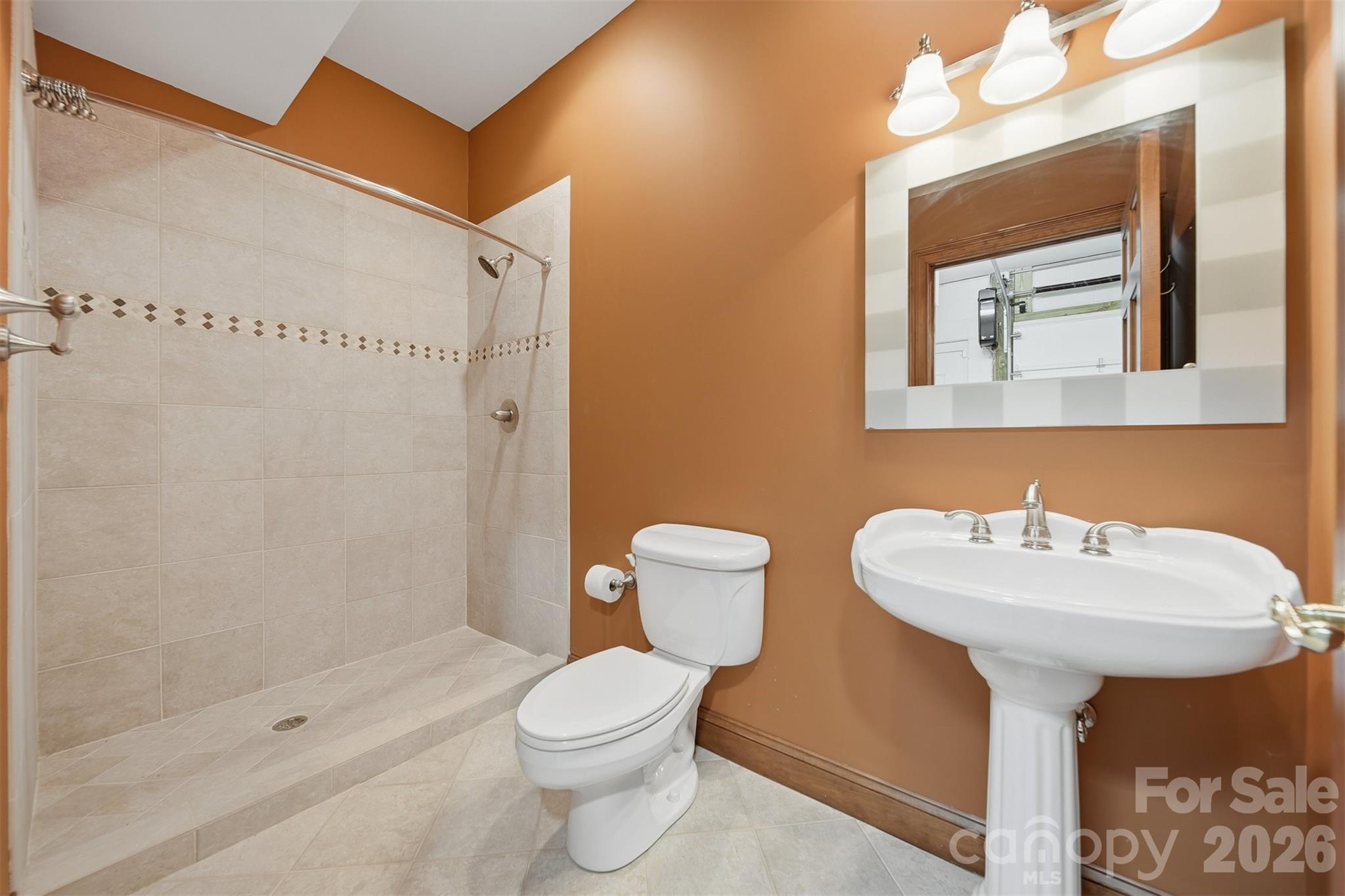 3619 Links Drive Conover, NC 28613 - Photo 42 of 48 a bathroom with a sink toilet and shower