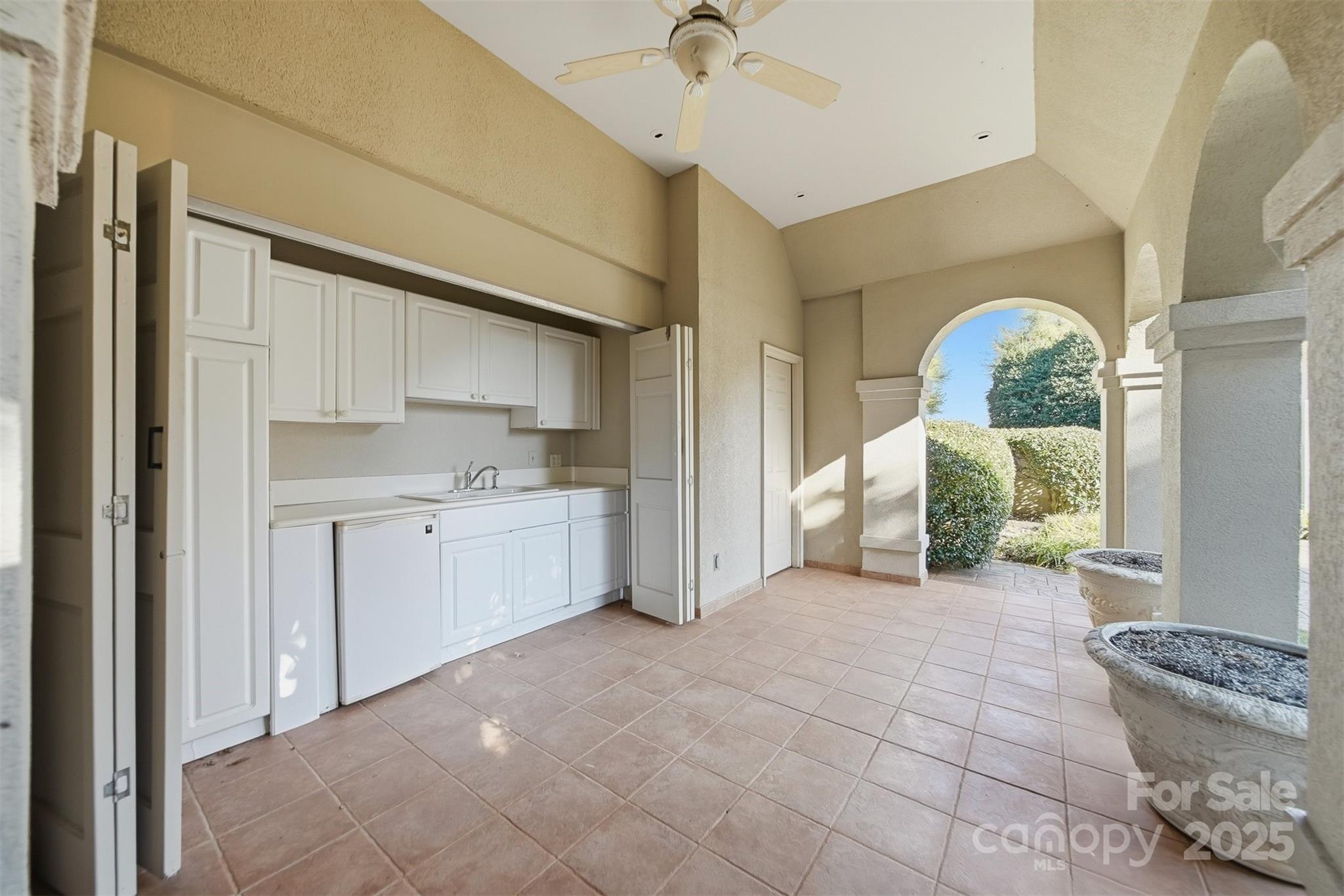 3619 Links Drive Conover, NC 28613 - Photo 45 of 48 a large white kitchen with cabinets a washer and dryer