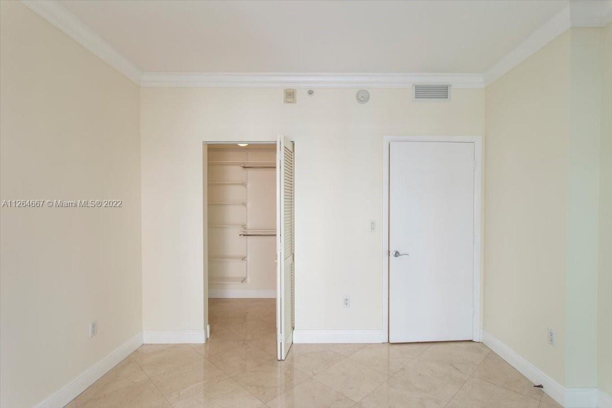 7275 Southwest 90th Street, Unit C310 Miami, FL 33156 - Photo 12 of 40 a view of an empty room