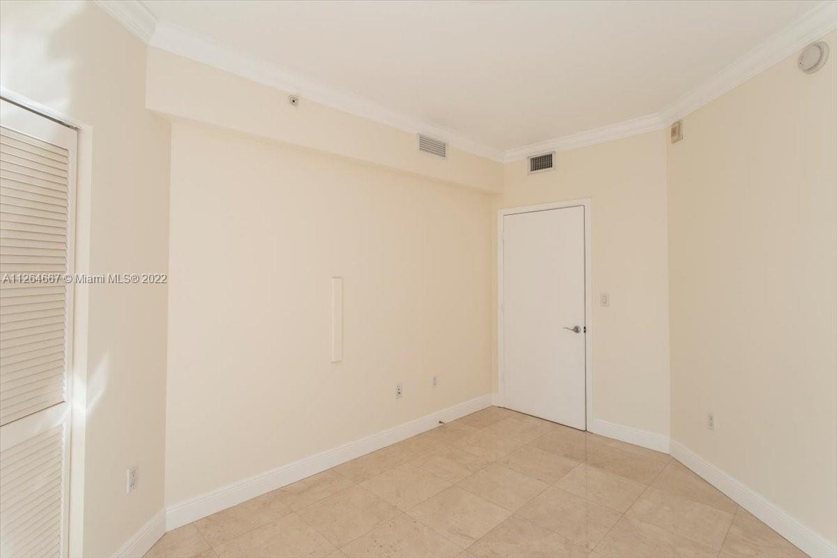 7275 Southwest 90th Street, Unit C310 Miami, FL 33156 - Photo 22 of 40 a view of an empty room