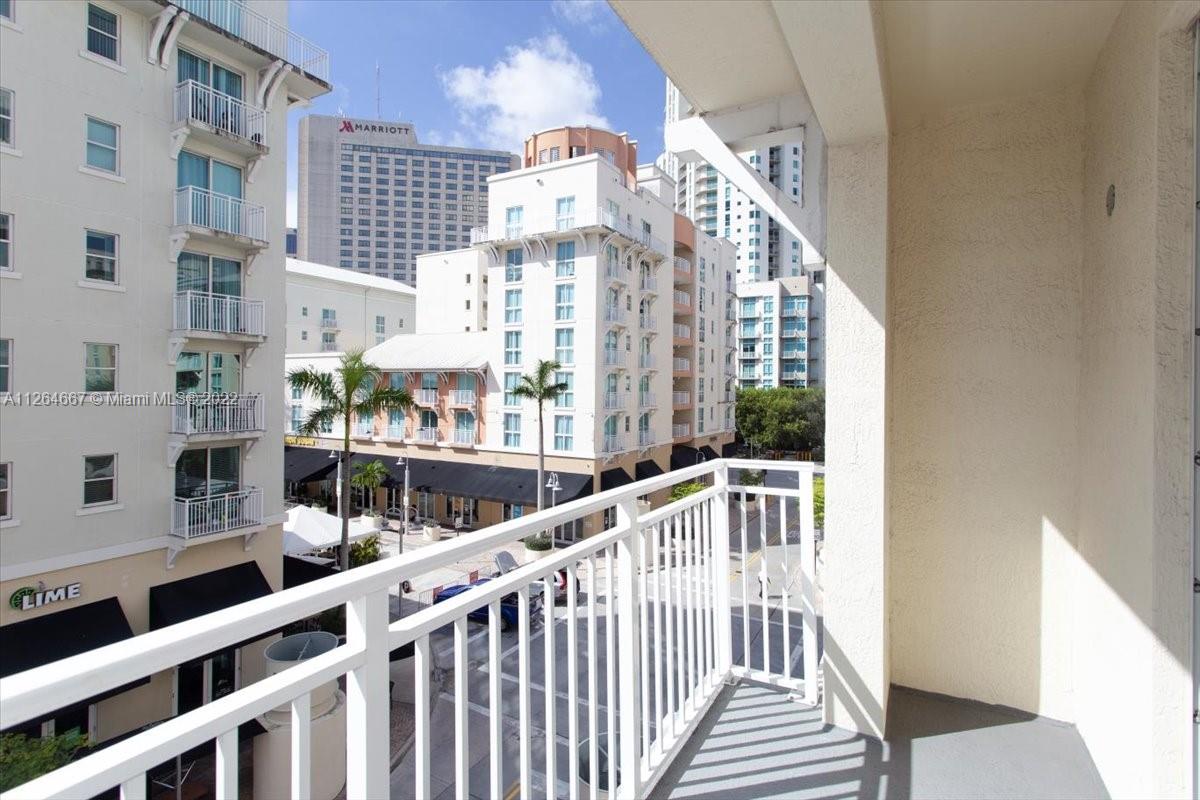 7275 Southwest 90th Street, Unit C310 Miami, FL 33156 - Photo 25 of 40 a view of balcony with furniture