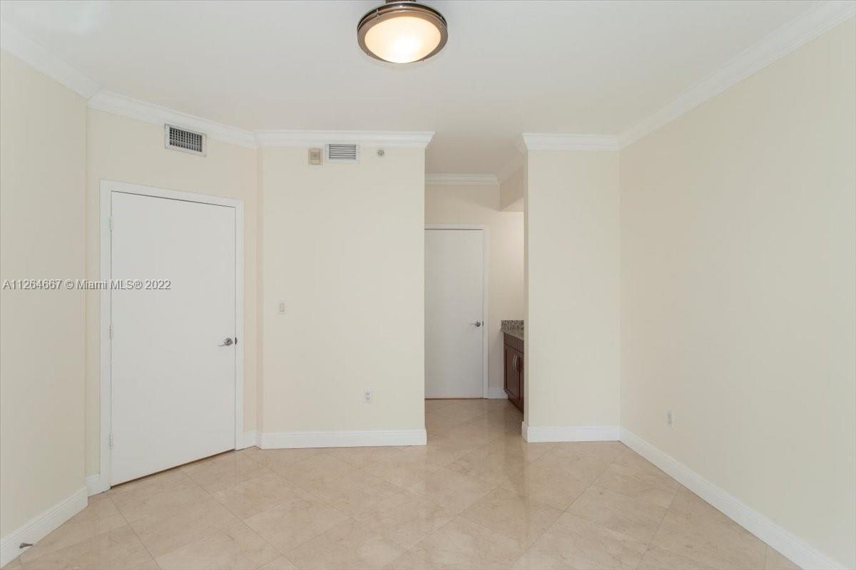 7275 Southwest 90th Street, Unit C310 Miami, FL 33156 - Photo 27 of 40 a view of an empty room