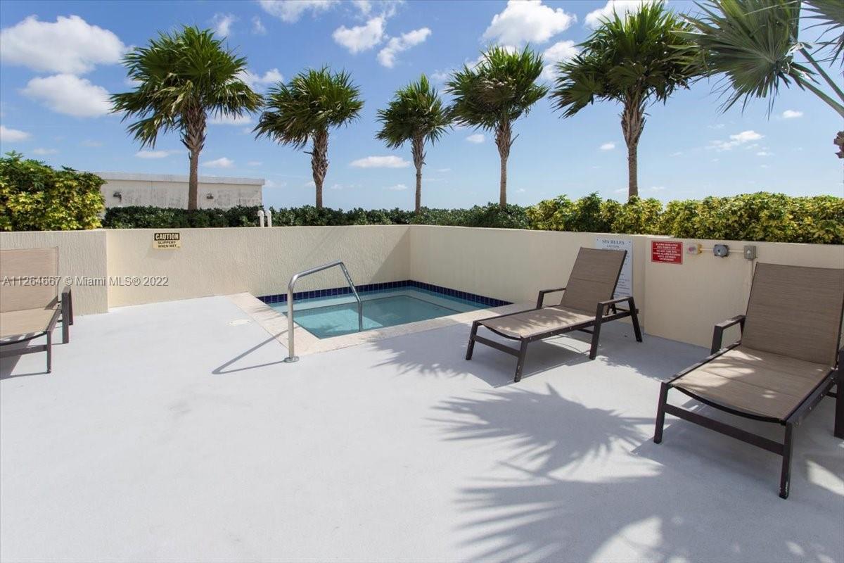 7275 Southwest 90th Street, Unit C310 Miami, FL 33156 - Photo 35 of 40 a view of a lake with outdoor space