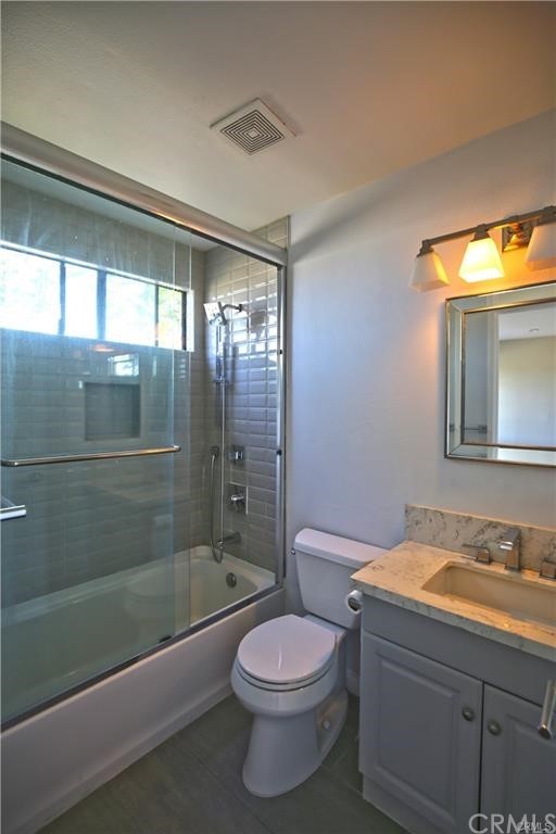 105 East Beacon Street, Unit A Alhambra, CA 91801 - Photo 11 of 15 a bathroom with a sink a toilet and shower